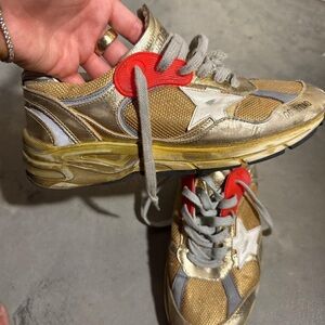 Golden Goose Gold and Red DadStar Shoes